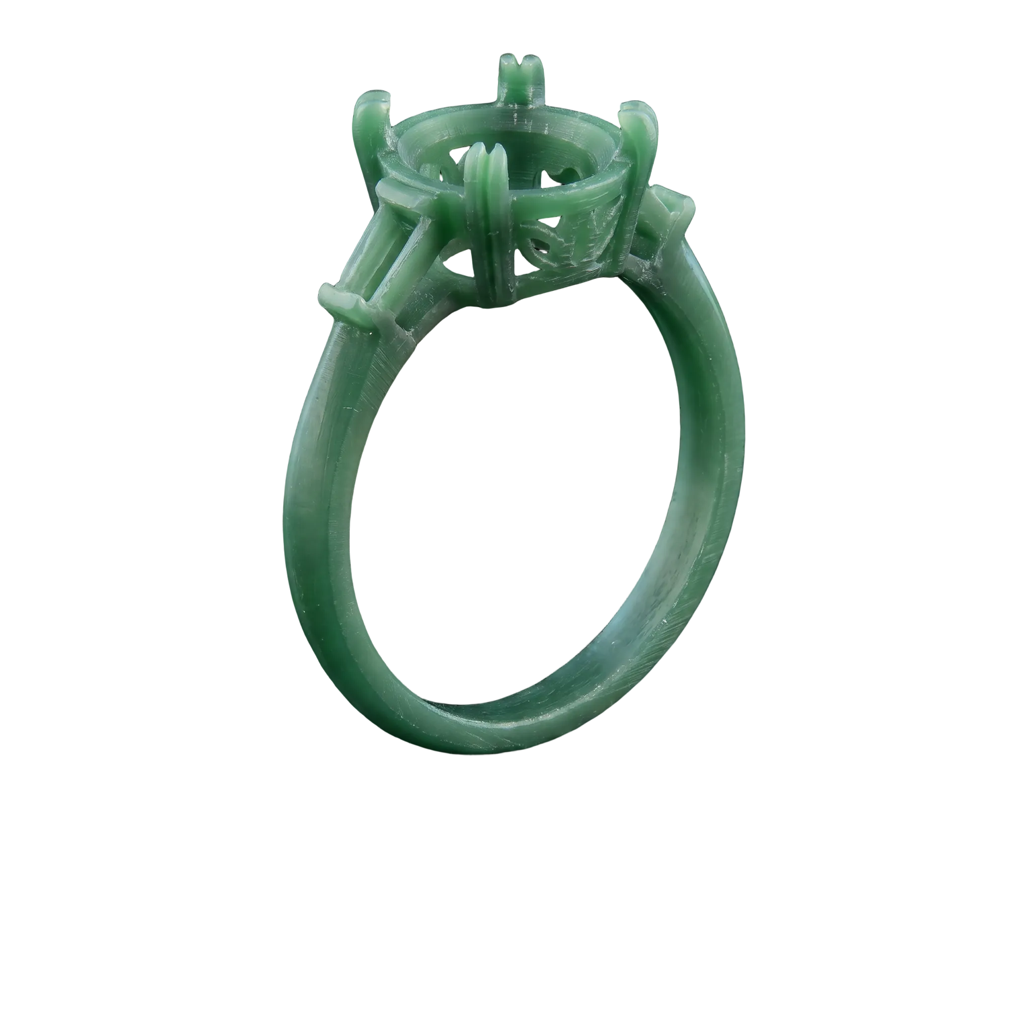 The ring as its model: carved in green jeweller’s wax.